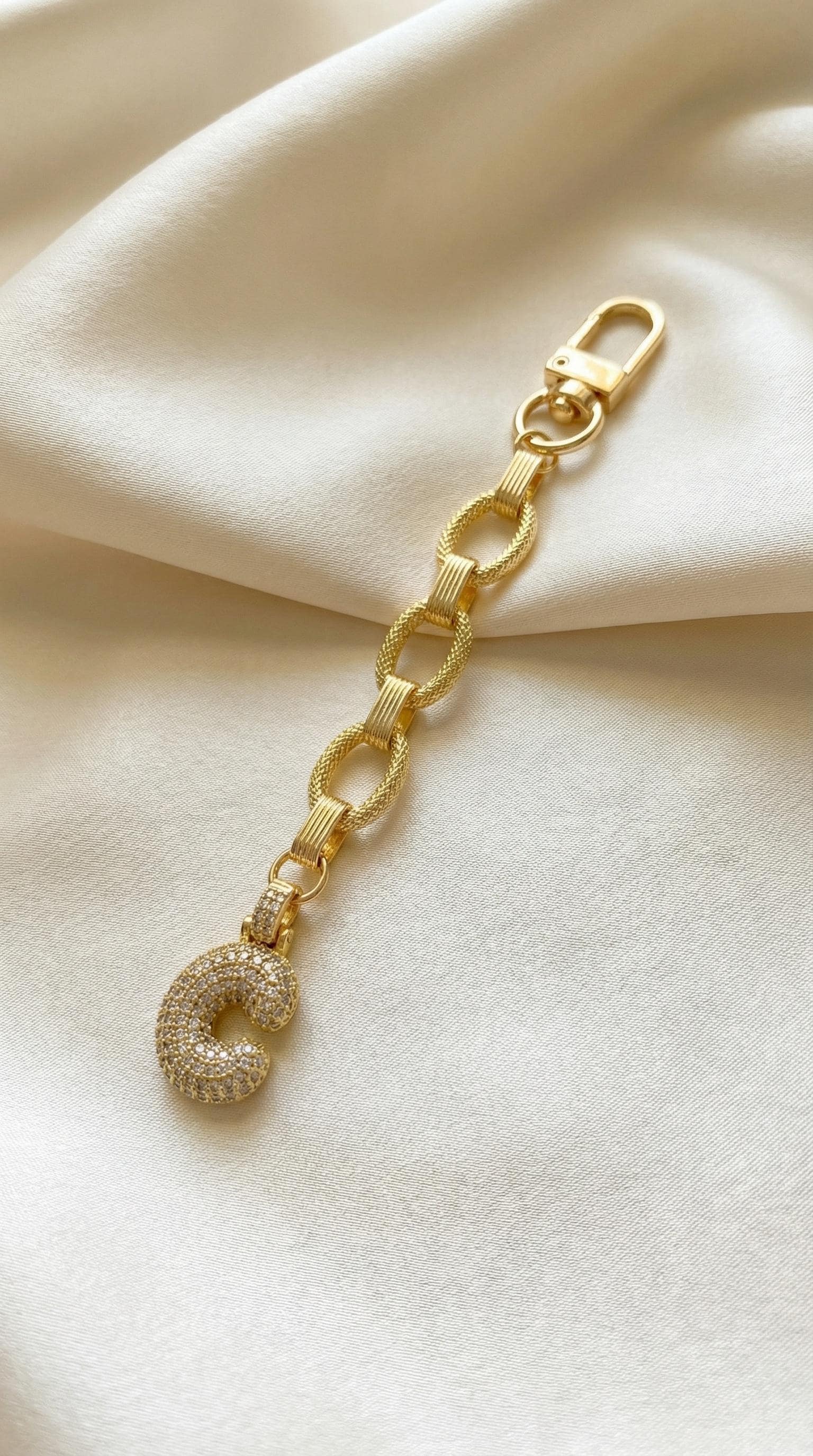 Gold Initial Charm Crystal Embellished Keychain Bubble Letter Design Personalized Accessory Sparkly Monogram Attachment Elegant Gift Option Custom Alphabet Character Decorative Bag Addition Fashion Forward Accessory Stylish Key Ring Purse