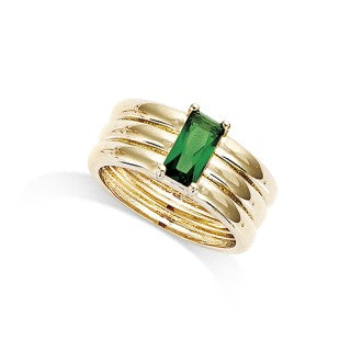 A gold ring with a rectangular green gemstone on a triple-layered band.